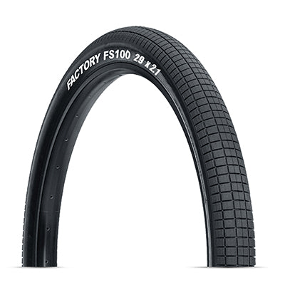 29x2.1 FS100 Bicycle Tire with evenly spaced rectangular blocks and knurled surfaces for enhanced traction and cornering, made from a proprietary rubber compound for durability and speed.