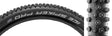 Close-up of the 29x2.25 Ice Spiker Pro Perf Lite RG Bicycle Tire, showcasing its tungsten carbide spikes and RaceGuard belting for puncture protection.