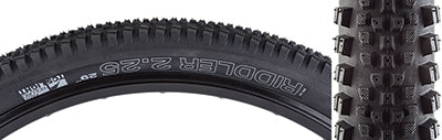 Close-up of the 29x2.25 Riddler TCS Light Fast Rolling Bicycle Tire, showcasing its densely packed tread and large side knobs designed for optimal cornering and efficiency on various trail conditions.