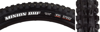 Close-up of a 29x2.3 Minion DHF DC/EXO/TR Bicycle Tire showcasing its tread pattern with ramped and channel-cut knobs designed for control and precise cornering.