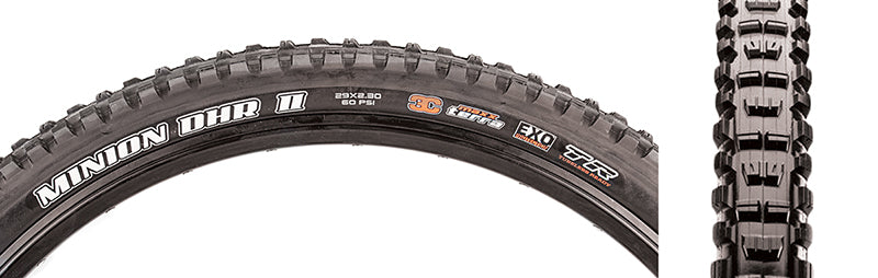 29x2.3 Minion DHR II TERRA/EXO/TR Bicycle Tire close-up showing tread pattern with paddle-like center line and corner lugs for traction, ideal for aggressive trail riding.