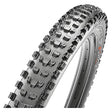 Close-up of the 29x2.4 Dissector 3CT/EXO+/TR Bicycle Tire, highlighting its round profile, large siped knobs, and robust tread designed for traction and reduced rolling resistance.