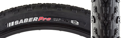 Close-up of a 29x2.4 Saber Pro TR Bicycle Tire showcasing its low profile tread, large edge knobs, and tubeless design, highlighting its minimal rolling resistance and enhanced traction for high-end racing.