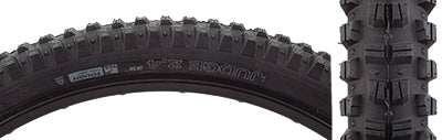 Close-up of a 29x2.4 Judge TCS Tough High Grip Bicycle Tire, highlighting its large alternating center and shoulder knobs, designed for improved grip and performance in various conditions.