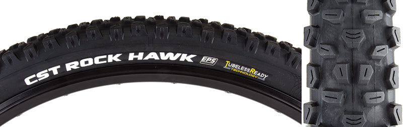 Close-up of a 29x2.4 Rock Hawk Fold Bicycle Tire showcasing aggressive tread pattern with large lugs and ramped center knobs, ideal for shedding debris and enhancing rolling resistance.