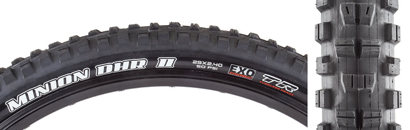 Close-up of the 29x2.4 Minion DHR II EXO/TR Bicycle Tire, highlighting paddle-like center knobs, siped tread for low rolling resistance, and reinforced shoulder knobs for enhanced corner grip.