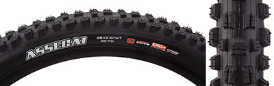 Close-up of the 29x2.5 Assegai EXO+/TR/WT Bicycle Tire, showcasing its alternating vertical knobs, deep siping, and large corner knobs for enhanced traction.