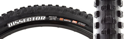 Close-up of the 29x2.6 Dissector TERRA/EXO+/TR/WT Bicycle Tire, highlighting its round profile, large siped knobs, and tread designed for optimal traction and reduced rolling resistance.