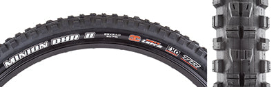 29x2.6 Minion DHR II TERRA/EXO/TR/WT Bicycle Tire with a tread pattern featuring paddle-like center knobs and improved shoulder knobs for enhanced cornering, designed for low rolling resistance and puncture protection.