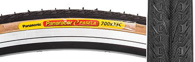 Close-up of a 700x23 Black/Tan Pasela Bicycle Tire, showcasing the hybrid commuter tread with a raised center for low rolling resistance, emphasizing the tire's detailed texture and design.