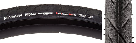 Close-up of the 700x23 Ribmo Fold Bicycle Tire, showcasing its detailed tread pattern. This urban/commuting tire features Protite puncture protection technology for enhanced durability.