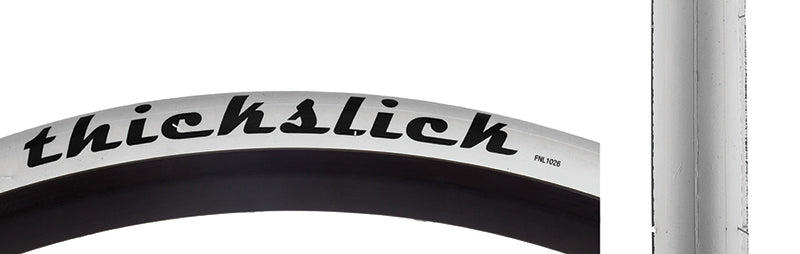 Close-up of the 700x25 White ThickSlick Comp Bicycle Tire showcasing its extra thick slick tread, known for puncture resistance and durability, highly favored by fixie riders.