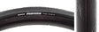 Close-up of the 700x25 Pursuer Bicycle Tire featuring a smooth tread with grooved shoulders, highlighted by the visible white text on the black tire, showcasing Maxxis' high grip compound and puncture-resistant casing.