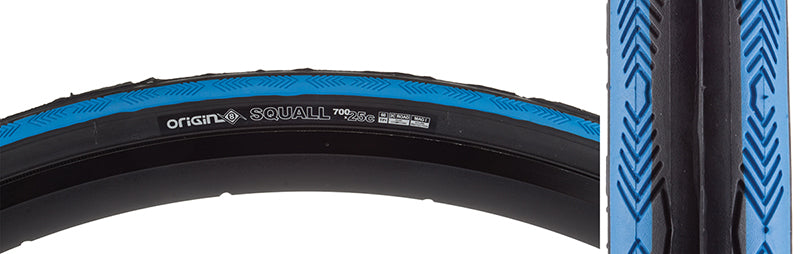 Close-up of the 700x25 Black/Blue Squall Bicycle Tire, showcasing its smooth, fast-rolling center and terraced shoulders designed for superior cornering grip and puncture protection.