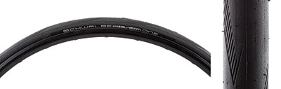 Close-up of the Schwalbe 700x25 One Raceguard Wire Bicycle Tire, highlighting the smooth tread and siped shoulder grooves for improved traction.