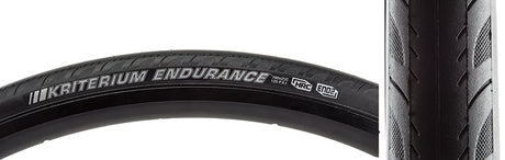 Close-up of the 700x25 Reflective Kriterium Enduro Pro Bicycle Tire, showcasing its grooved side tread for traction and dual-layer puncture protection.