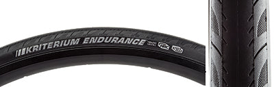 Close-up of the 700x25 Kriterium Enduro Sport Bicycle Tire showcasing its grooved side tread and robust design, emphasizing dual layer puncture protection and the HRC Hard Rubber Compound for endurance training.