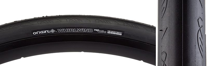 Close-up of the 700x25 Whirlwind Bicycle Tire showcasing its smooth tread and minimalistic shoulder siping, designed for racing performance with enhanced grip and puncture protection.