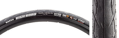 Close-up of the 700x25 High Road K2/TR Bicycle Tire, highlighting its smooth center tread, siped and micro-knurled shoulders, and tubeless-compatible carbon bead design for optimal traction and durability.