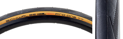 Close-up of the 700x25 Pro One TT Bicycle Tire featuring smooth tread for road racing, light shoulder siping for improved control, and tubeless-compatible casing.