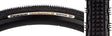 Close-up of a 700x28 Black/Black Gravel King SK Bicycle Tire, showcasing the tread with five rows of square knobs and continuous ridges, designed for smooth rolling and superior grip on rough or gravel roads.