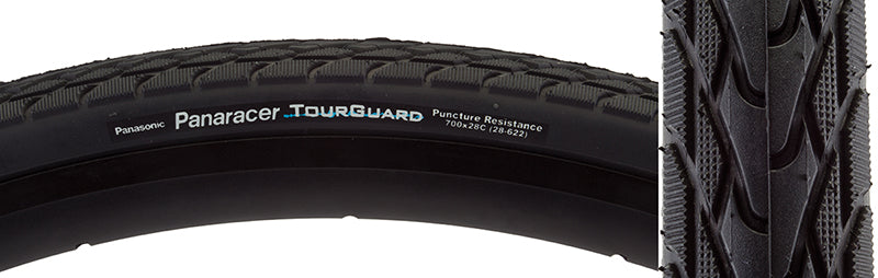 Close-up of the 700x28 Tourguard Bicycle Tire, showcasing its tread pattern and white text branding. Designed for urban or touring use, it features aramid belting for puncture protection and excellent wet weather performance.