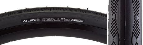 700x28 Squall Bicycle Tire close-up, showcasing its smooth, fast-rolling center with terraced shoulders for enhanced cornering grip, highlighting the puncture protection layer beneath the tread surface.