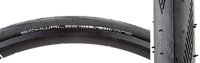 Close-up of a 700x28 One Performance Microskin Raceguard Bicycle Tire showcasing its smooth tread and siped shoulder grooves for improved traction.