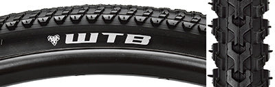 Close-up of a 700x32 All Terrain Comp Bicycle Tire showcasing its tread pattern, robust casing, and wire bead. Suitable for urban and hardpack surfaces, designed for non-tubeless use.