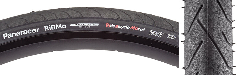 Close-up of the 700x32 Ribmo Fold Bicycle Tire, showcasing its tread pattern. Ideal for urban commuting, it features Panaracer's Protite puncture protection technology for durability.