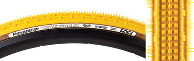 Close-up of the 700x32 Mustard Gravel King SK Bicycle Tire showing five rows of square knobs between double continuous ridges for smooth rolling and grip, ideal for rough and gravel roads.