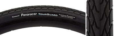 Close-up of the 700x32 Tourguard Bicycle Tire showcasing its tread pattern and aramid belting designed for puncture protection, ideal for urban and touring use with excellent wet weather performance.