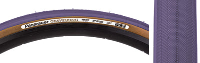 Close-up of the 700x32 Purple Gravel King Slick Bicycle Tire, showcasing its minimal file-style tread and robust volume designed for superior grip on gravel and tightly packed dirt surfaces.