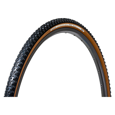 Close-up of the 700x33 Black/Brown Gravel King Extreme Knobby+ Bicycle Tire, showcasing its new tread pattern with long vertical center blocks and ramped shoulder lugs for maximum grip and fast rolling.