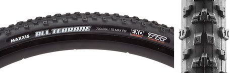 Close-up of the 700x33 All Terrane DC/EXR/TR Fold/60 Bicycle Tire, highlighting its micro-diamond and stacked paddle knobs, designed for speed and traction on hardpacked surfaces.