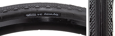 Close-up of the 700x34 Black/Black Byway TCS Bicycle Tire showing its smooth centerline, diamond-shaped peaks, and substantial shoulder knobs for enhanced traction.