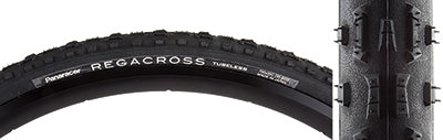 Close-up of the 700x35 RegaCross Bicycle Tire, showcasing its tread with long vertical knobs and low profile design for optimal muck transfer, balanced rolling resistance, and grip.