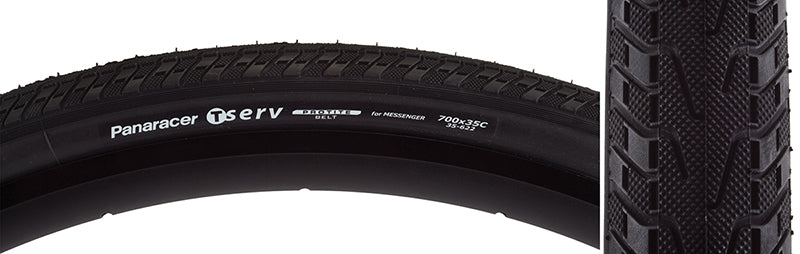 700x35 T-Serv Bicycle Tire close-up shows white text on a black rubber surface. Designed for urban use, it features an aramid belt to protect against punctures and pinch flats.