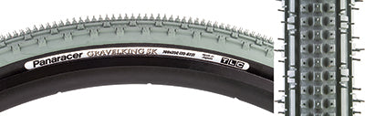 Close-up of the 700x35 Olive/Black Gravel King SK Bicycle Tire, showcasing its square knobs and continuous ridges designed for smooth rolling and superb grip on rough or gravel roads.