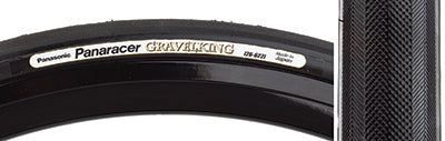 Close-up of the 700x35 Black/Black Gravel King Slick Bicycle Tire, showcasing its minimal tread and robust volume designed for both road and gravel, featuring Panaracer's Natural Rubber Compound for superior grip.