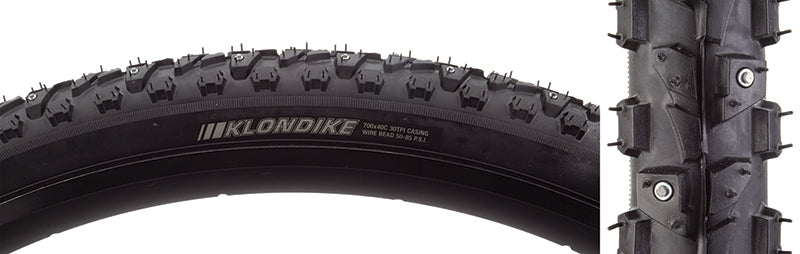 Close-up of the 700x35 Klondike Skinny Sport Bicycle Tire, highlighting its tread design with alternating studs and smooth center line, ideal for winter cycling on snow and ice.