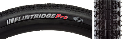 Close-up of the 700x35 Reflective Flintridge Pro TLR Bicycle Tire highlighting its tread pattern and reflective sidewall striping, designed for optimal traction and visibility in low light conditions.