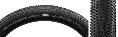 Close-up of the 700x35 G-One Allround Evolution Lite Bicycle Tire, showcasing densely packed micro knobs, round profile, and intricate tread pattern for optimal gravel use.