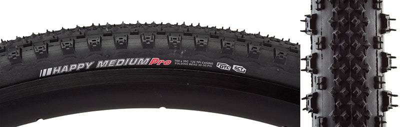 Close-up of the 700x35 Reflective Happy Medium Pro Bicycle Tire showcasing its fast rolling center tread and aggressive outer edges for cornering control, with reflective sidewall striping for enhanced visibility.