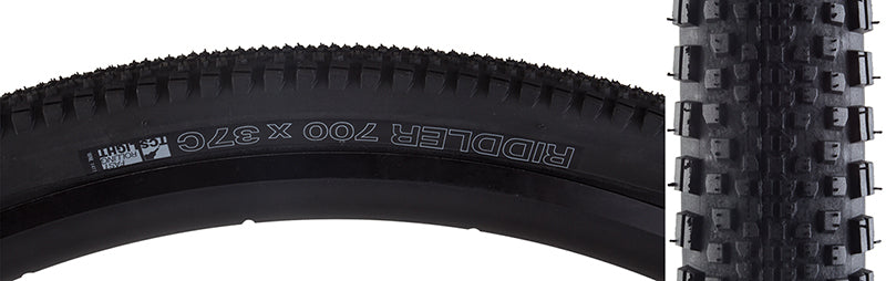 Close-up of a 700x37 Black/Black Riddler TCS Light Fast Rolling Bicycle Tire, showcasing its densely packed tread and pronounced side knobs, designed for optimal cornering on varied trail conditions.