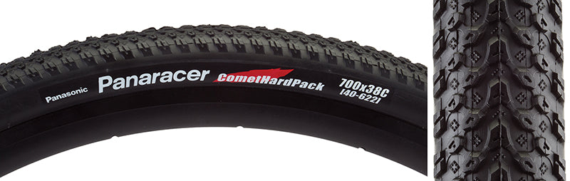 Close-up of the 700x38 Comet HardPack Bicycle Tire, showcasing its tread design ideal for XC and hardpack conditions. The synthetic rubber and wheel structure are clearly visible.