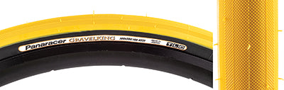 Close-up of the 700x38 Mustard/Black Gravel King Slick Bicycle Tire, showcasing its minimal file tread and robust volume designed for versatile performance on both road and gravel terrains.