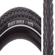 700x38 Reflective Kwick Drumlin Sport KS+ Bicycle Tire, featuring close-up of thick tread with deep siping, textured burly shoulder lugs, and reflective sidewall striping for low light visibility.