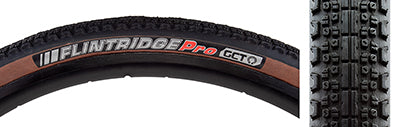 Close-up of the 700x40 Flintridge Pro Bicycle Tire showcasing its smooth center tread and micro-knobbed shoulders, emphasizing the tire's dual tread compound and tubeless-ready features designed for improved performance and puncture protection.