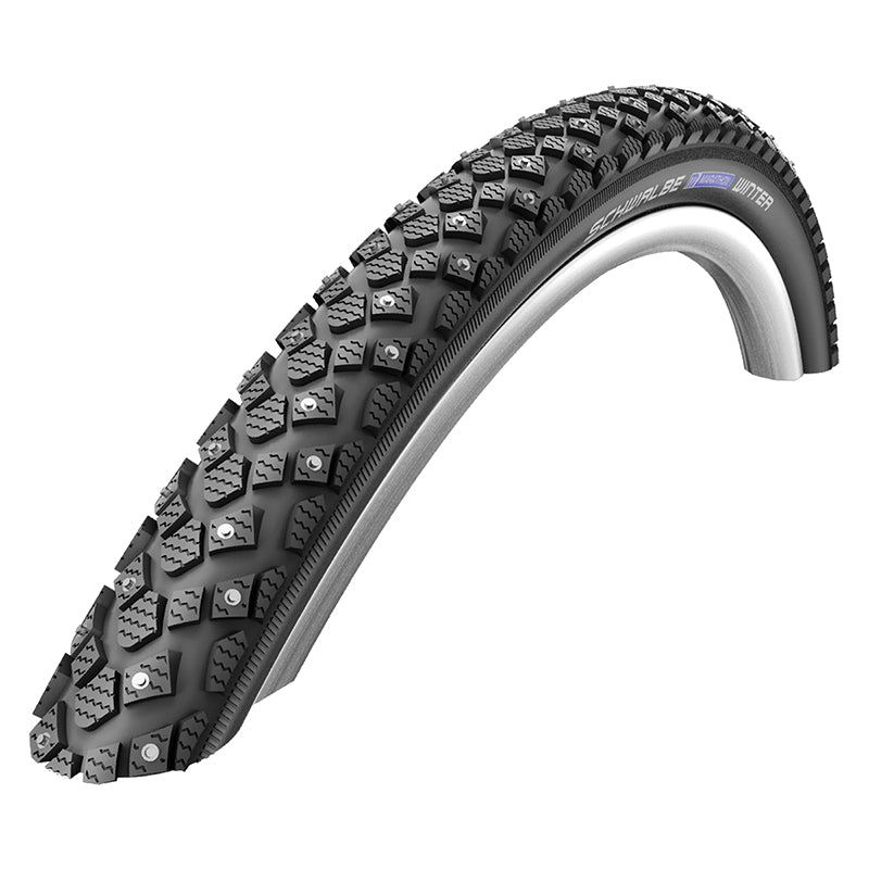 700x40 Reflective Marathon Winter Plus Performance Twin SmartGuard Bicycle Tire with studded treads, carbide studs, and micro-siped knobs, designed for traction on ice and protection against cuts.